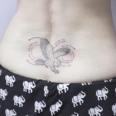 Tatu sova na poyasnice