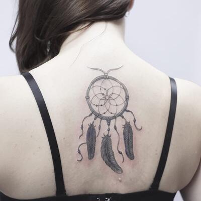 Tatu lovec snov na spine